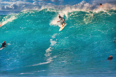 High angle view of man surfing in sea