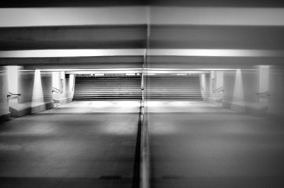 Reflection of empty subway on glass