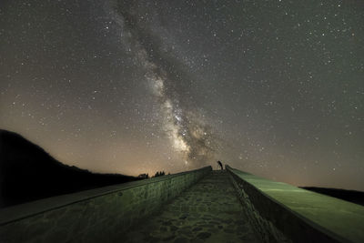 Scenic view of star field against sky at night