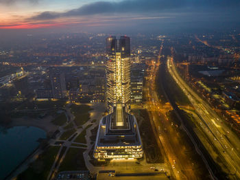 Hungary - budapest landscape with the amazing highest skyscraper, mol hq, from drone view at night