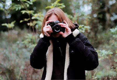 Portrait of man photographing