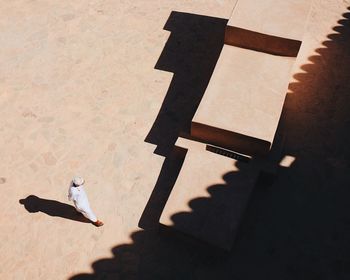 Shadow of people on street