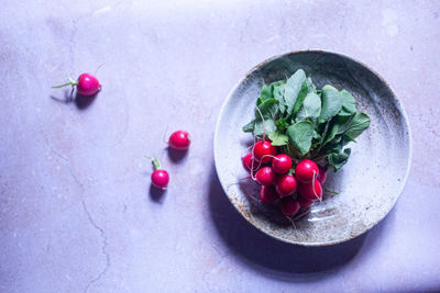 High angle view of cherries in bowl