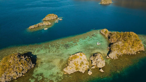 Beach, tropical island, sea bay and lagoon, palawan.lagoon with blue in the middle of small islands 