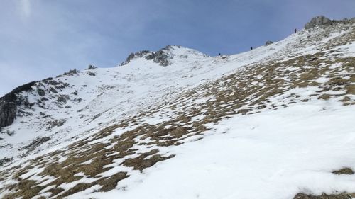 Snow covered mountains against sky