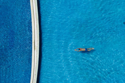 High angle view of person swimming in pool