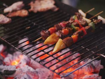 Close-up of meat on barbecue grill