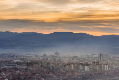 High angle view of townscape against sky during sunset