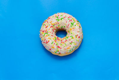 High angle view of ice cream against blue background