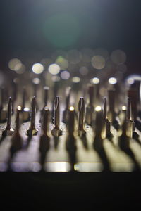 Close-up of illuminated lights on table