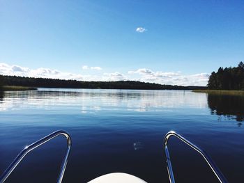 Reflection of clouds in calm lake