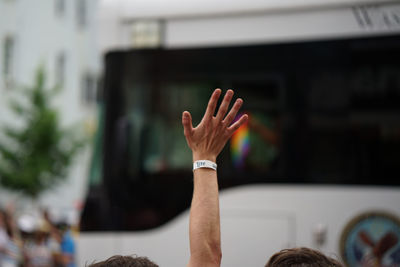 Cropped image of hand against blurred background