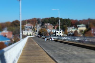 Railroad tracks against clear sky