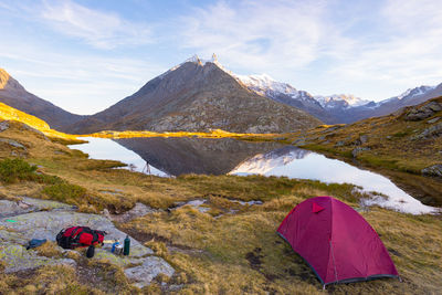 Scenic view of mountains and lake against sky