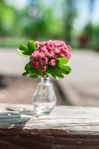 Close-up of flower vase on table