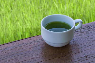 High angle view of coffee cup on table