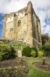 Low angle view of old building against sky