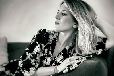 Portrait of a young woman looking away