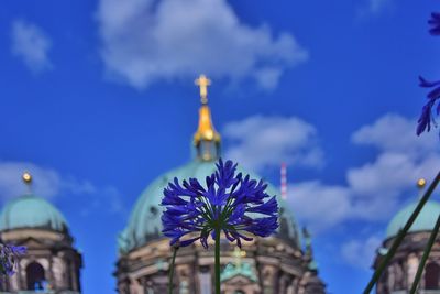 Low angle view of cathedral against cloudy sky