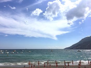 Scenic view of sea against cloudy sky