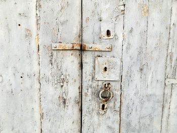 Close-up of damaged wooden door
