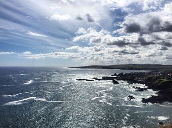 Scenic view of calm sea against blue sky