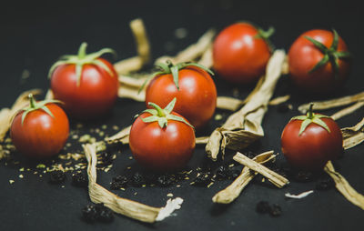Close-up of tomatoes and black background