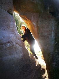 Man standing in cave