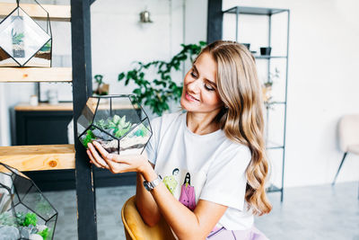 Beautiful woman smiling in a room