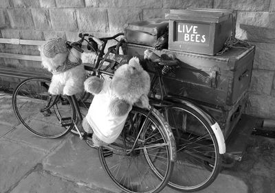 Close-up of bicycle against wall