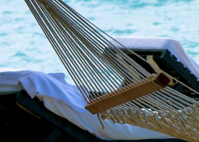 Hammock against cloudy sky