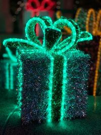 Close-up of illuminated christmas tree at night