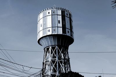 Low angle view of water tower against sky