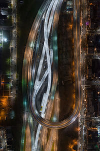 Light trails on road in city at night