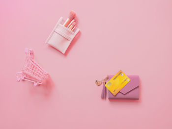 High angle view of toys on table against gray background