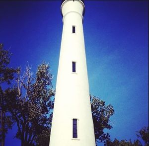 Low angle view of built structure against blue sky