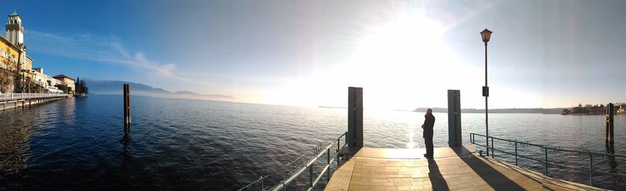 Panoramic view of sea against sky during sunset