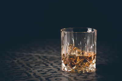 Close-up of drinking glass on table