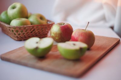 Close-up of apples on cutting board