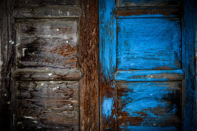 Full frame shot of weathered wooden door