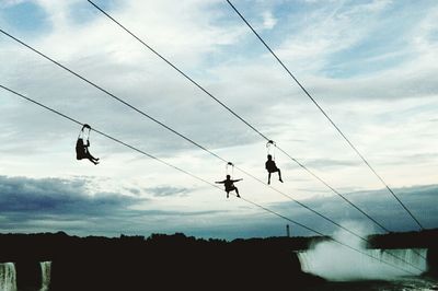 Low angle view of electricity pylon