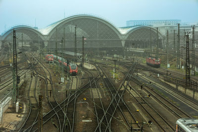 Train on railroad tracks against sky