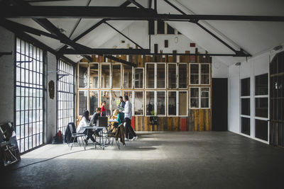 It professionals brainstorming while having meeting in new start-up office