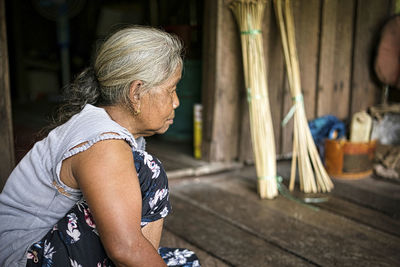 A close-up profile of a single indigenous woman