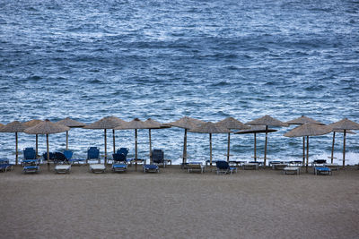 Scenic view of beach against blue sky