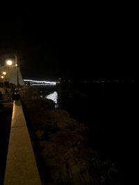 Illuminated street lights at night