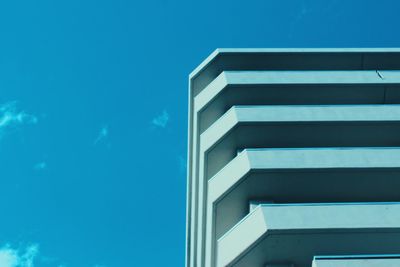 Low angle view of building against blue sky