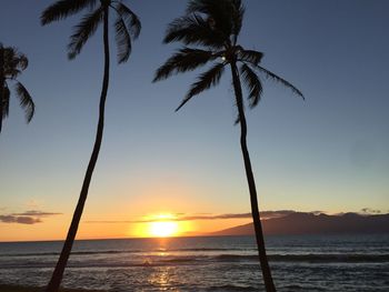 Scenic view of sea at sunset