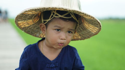 Cute baby boy wearing hat