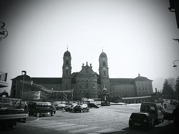 Buildings against clear sky